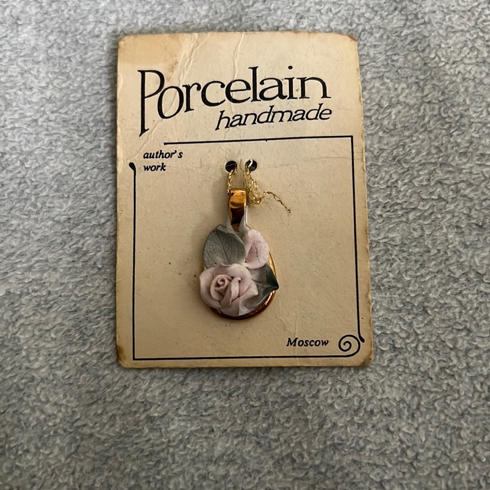 Porcelain handmade pendant with light pink rose made in moscow